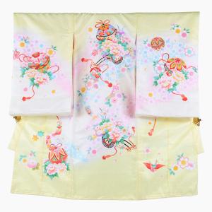 背に鈴と花車と折り鶴