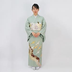 飛び立つ鶴・緑