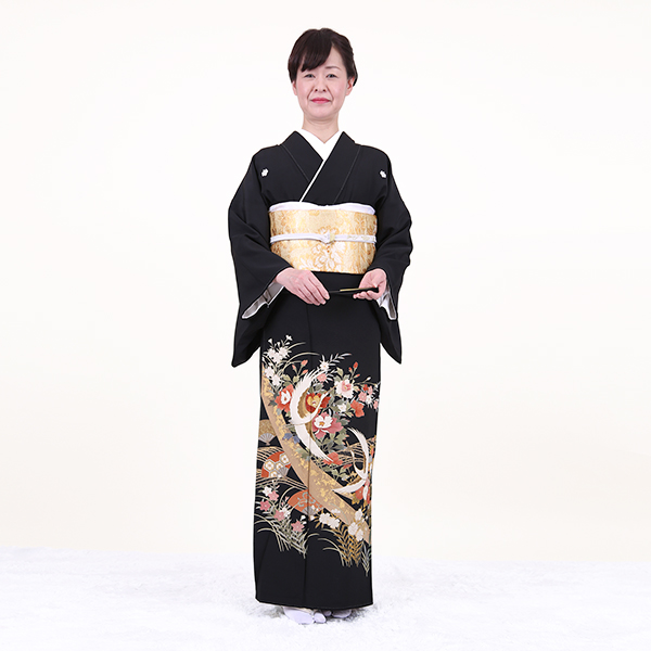 扇流しに鶴羽ばたく